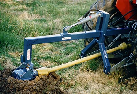 down pressure post hole digger